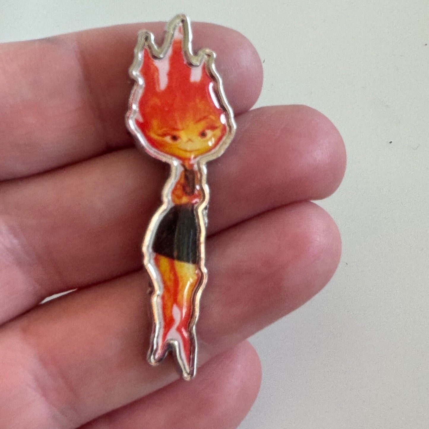 EMBER LUMEN FROM DISNEY PIXAR'S FILM ELEMENTAL LIMITED RUN PROMOTIONAL PIN/BADGE
