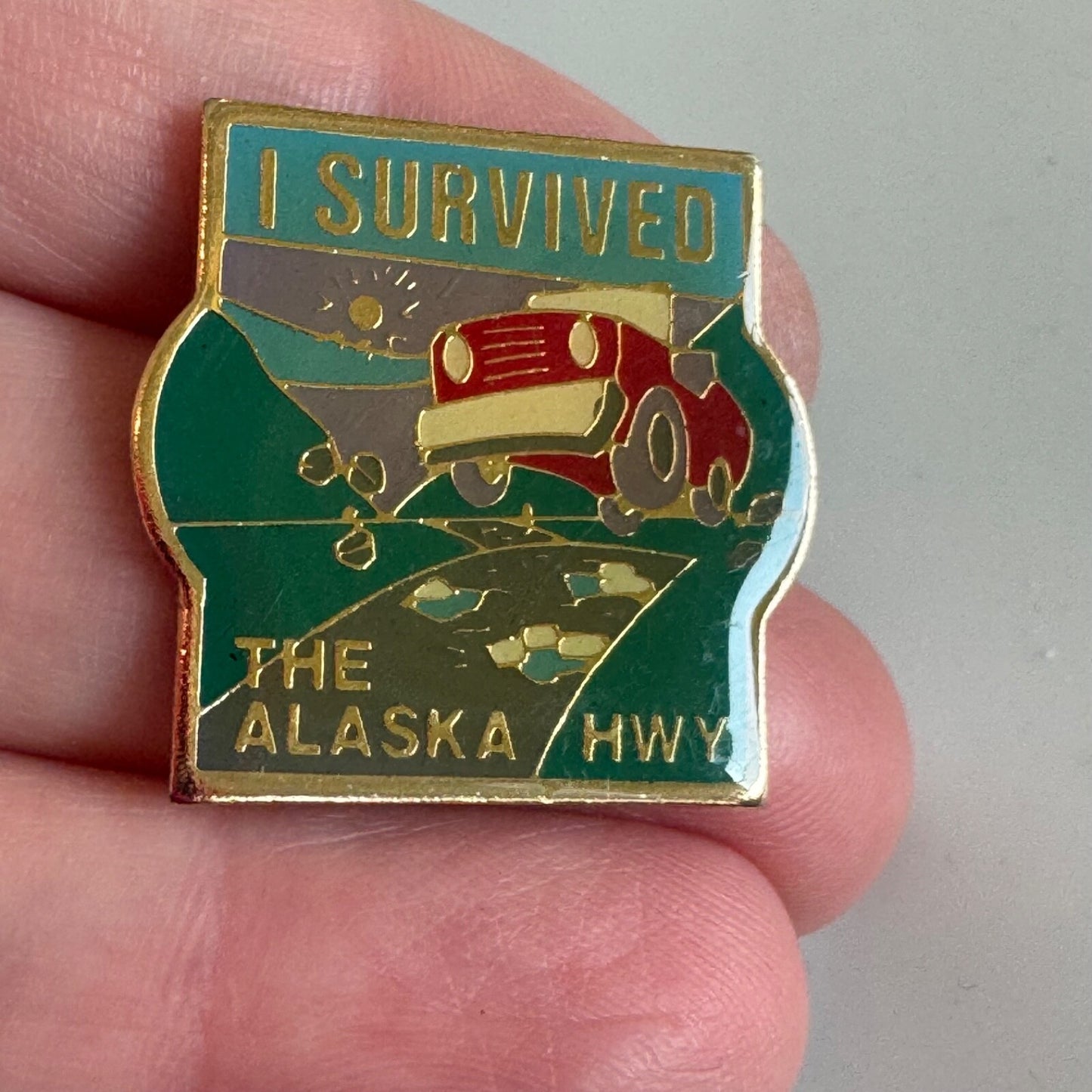 I Survived the Alaska Highway Enamel Pin Red Jeep Scenic Road