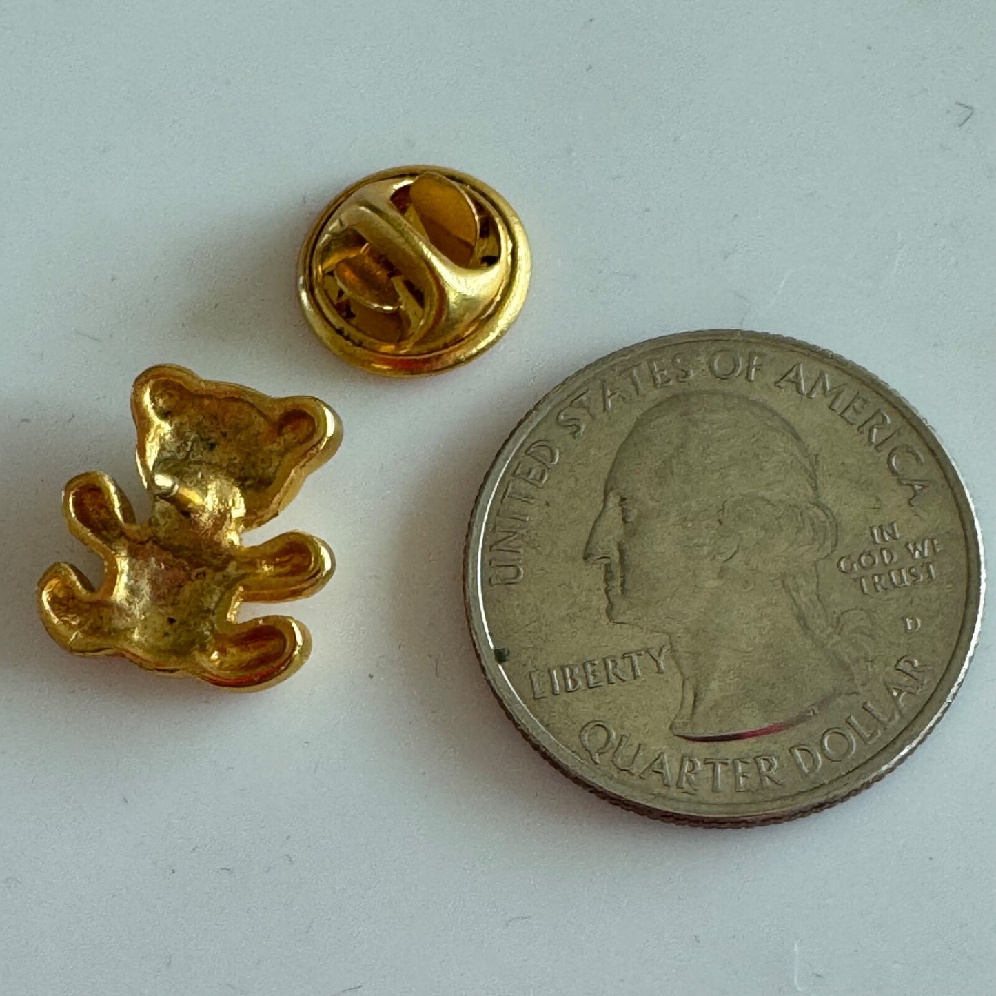 Gold Teddy Bear Brooch with Red Rhinestone Eyes – Vintage Toy Style Pin