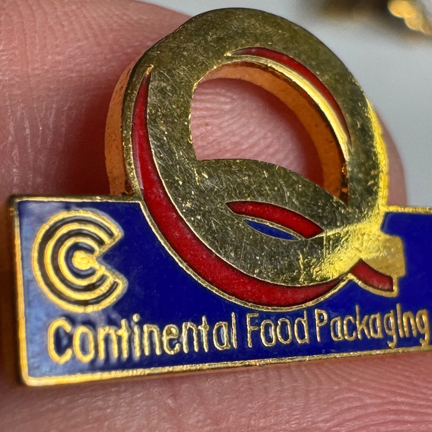 Vintage Continental Food Packaging Q Lapel Pin Enamel
