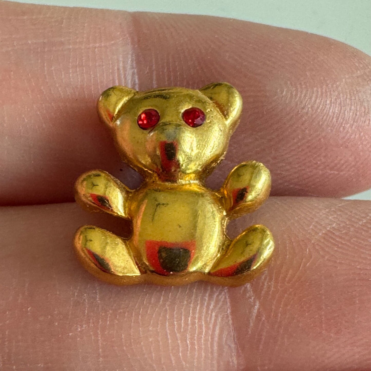 Gold Teddy Bear Brooch with Red Rhinestone Eyes – Vintage Toy Style Pin