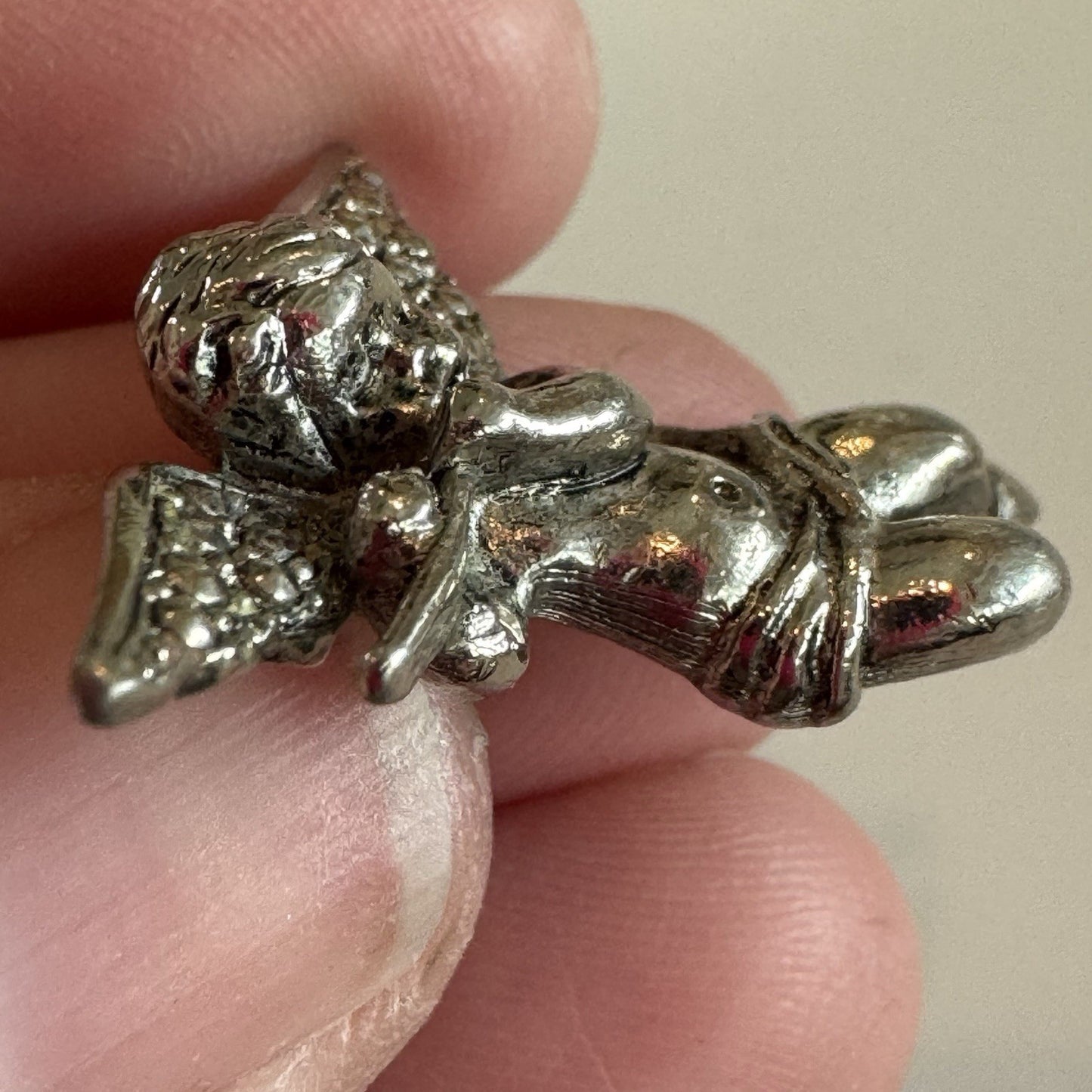 AVON Angel Lapel Pin Silver Tone Faux Marcasite Cherub Wings Flute Playing