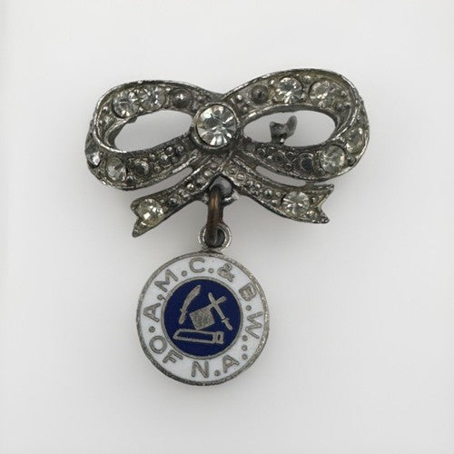 UNIQUE A.M.C.& B.W. Of N.A. MEAT CUTTERS AND BUTCHERS UNION VINTAGE ENAMEL PIN
