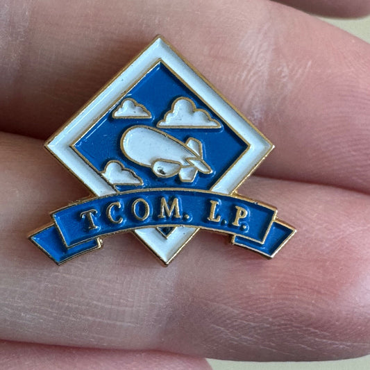 TCOM L.P. Tethered Aerostats Lapel Pin Blimp Logo Tie Tack