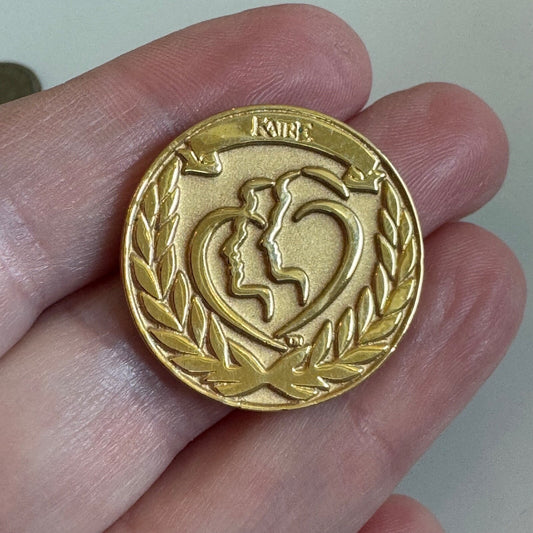 KAIRE Gold Medallion Award Pin with Silhouette Heart Supplements