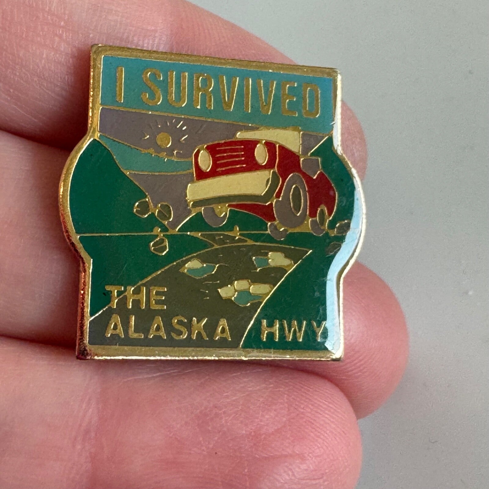 I Survived the Alaska Highway Enamel Pin Red Jeep Scenic Road 