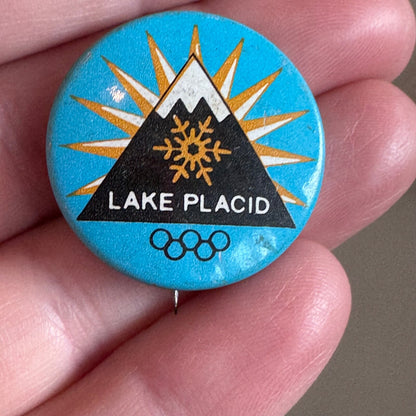 Vintage Lake Placid Rings Tin Button Lapel Pin Button