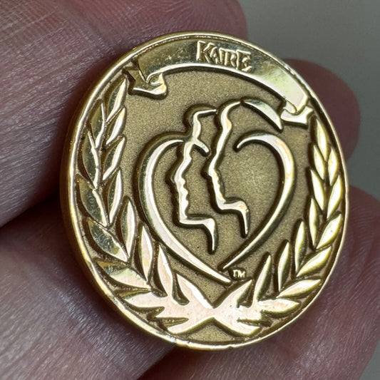 KAIRE Gold Medallion Award Pin with Silhouette Heart Supplements