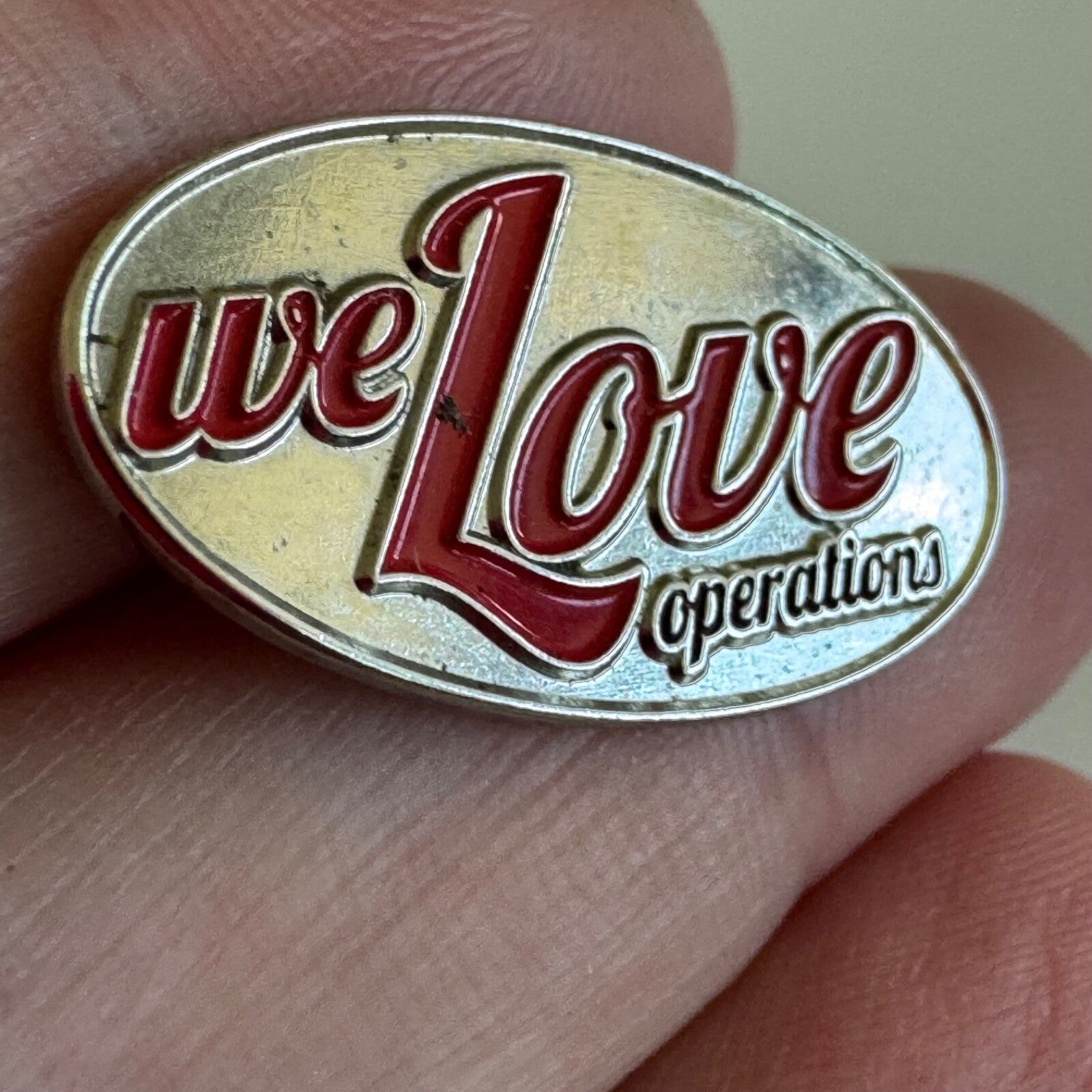 Vintage We Love Operations Silver Tone Lapel Pin