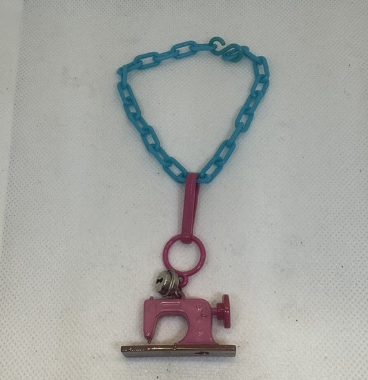 Vintage 1980s Plastic Bell Charm Pink Sewing Machine Charm Plus Blue Bracelet