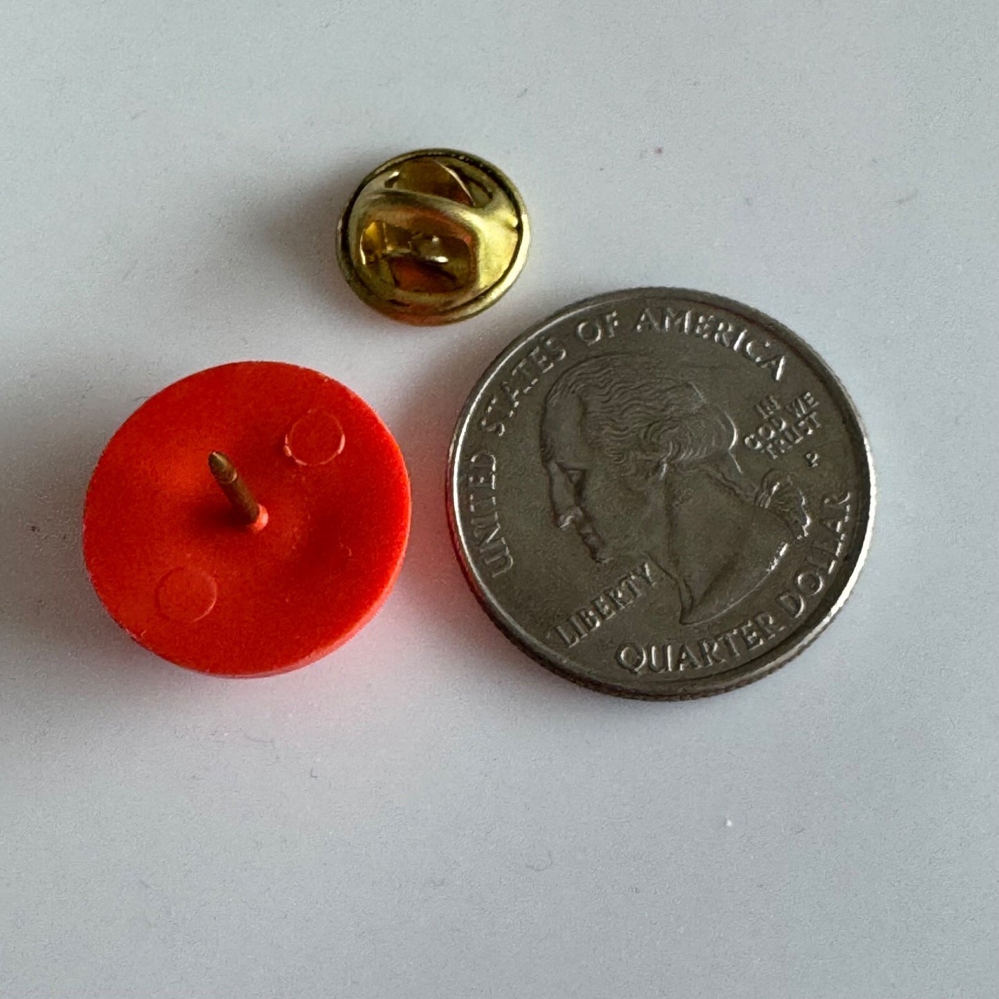 Vtg “Trapped by Brandy” Novelty Clay Target Pin – Funny Orange Lapel Badge