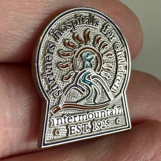 Shriners Hospitals for Children Intermountain Pin – Sunburst & Mountain Emblem