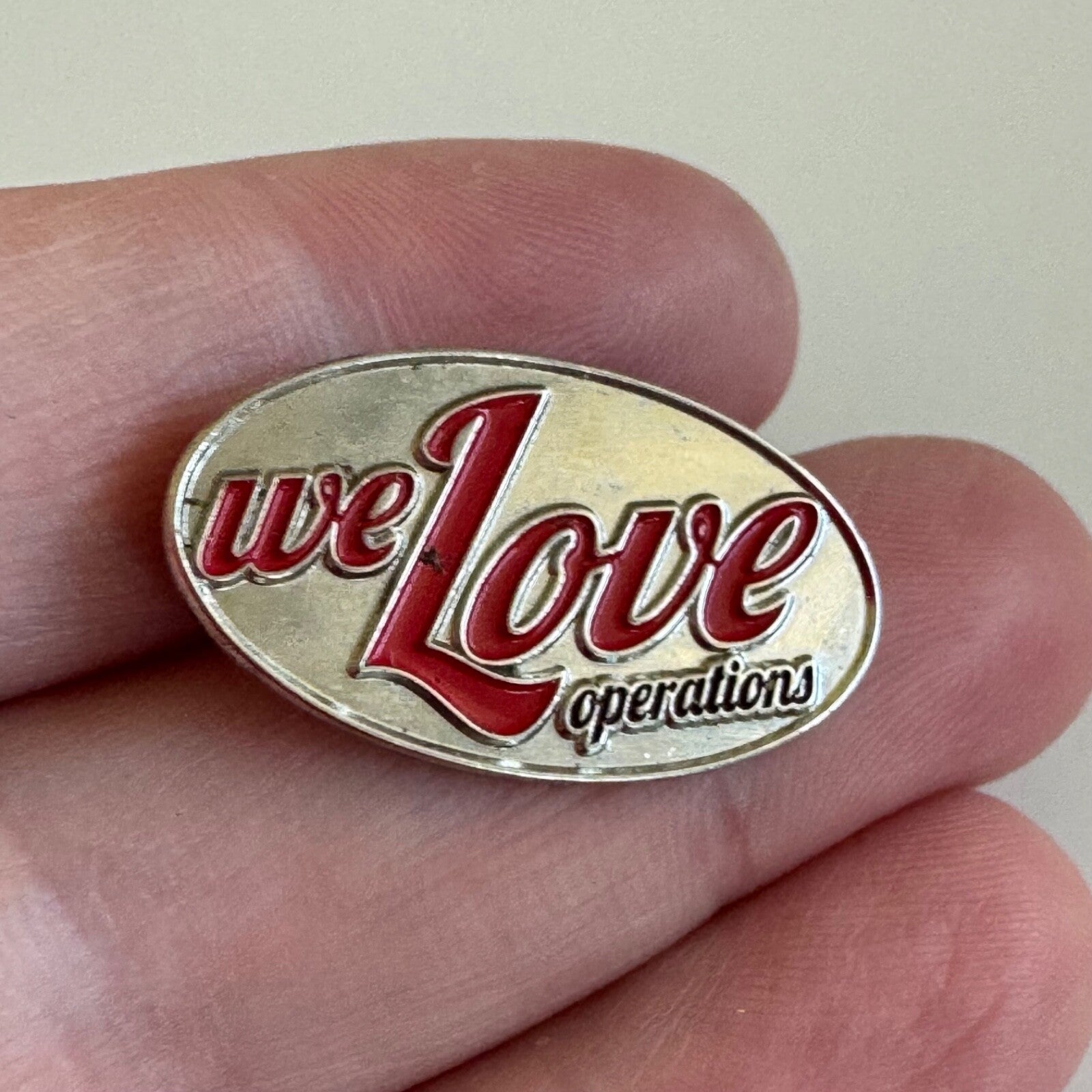 Vintage We Love Operations Silver Tone Lapel Pin