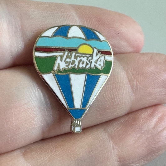Nebraska Hot Air Balloon Enamel Pin – State Souvenir with Sun