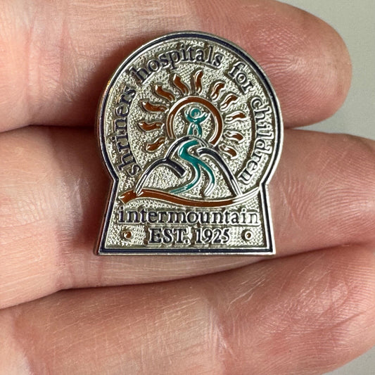 Shriners Hospitals for Children Intermountain Pin – Sunburst & Mountain Emblem