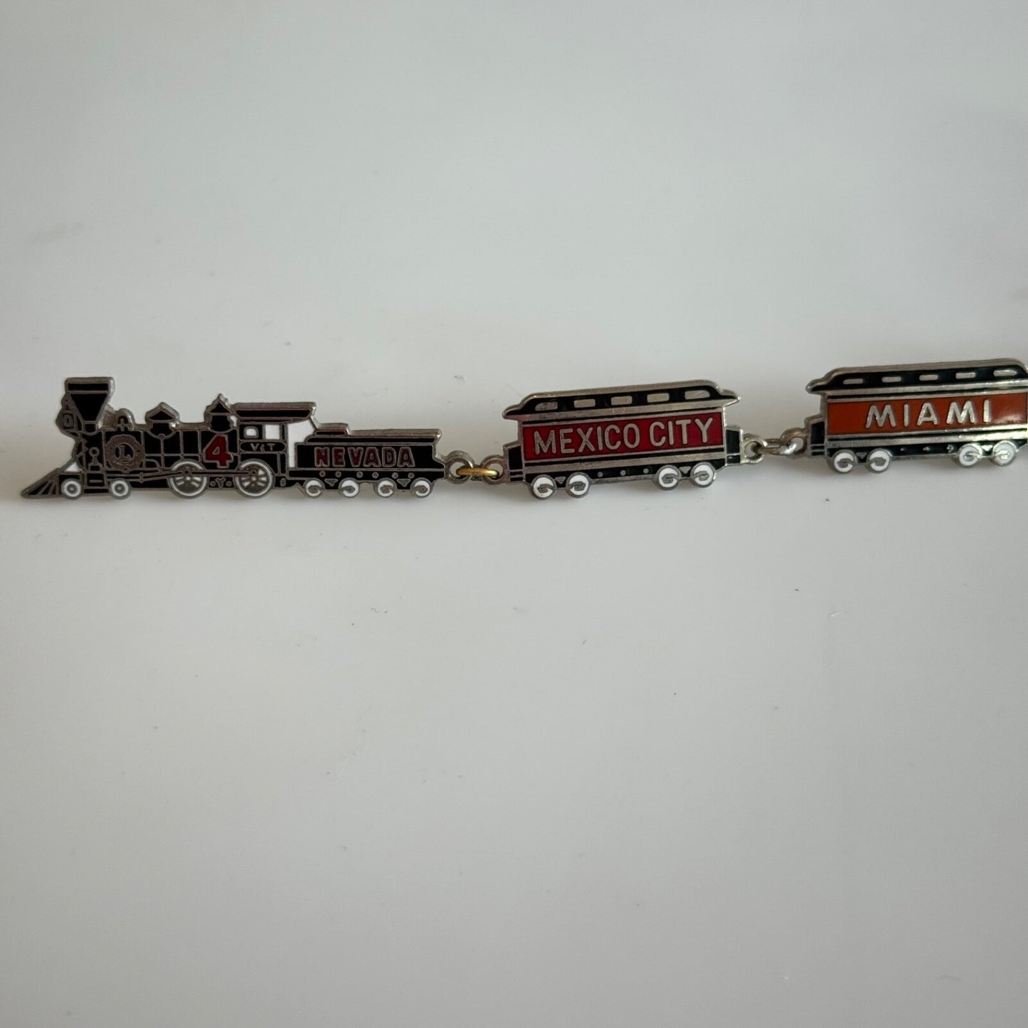 1974 LIONS CLUB GROUP OF 6 TRAIN PINS Nevada Mexico City Miami Honolulu