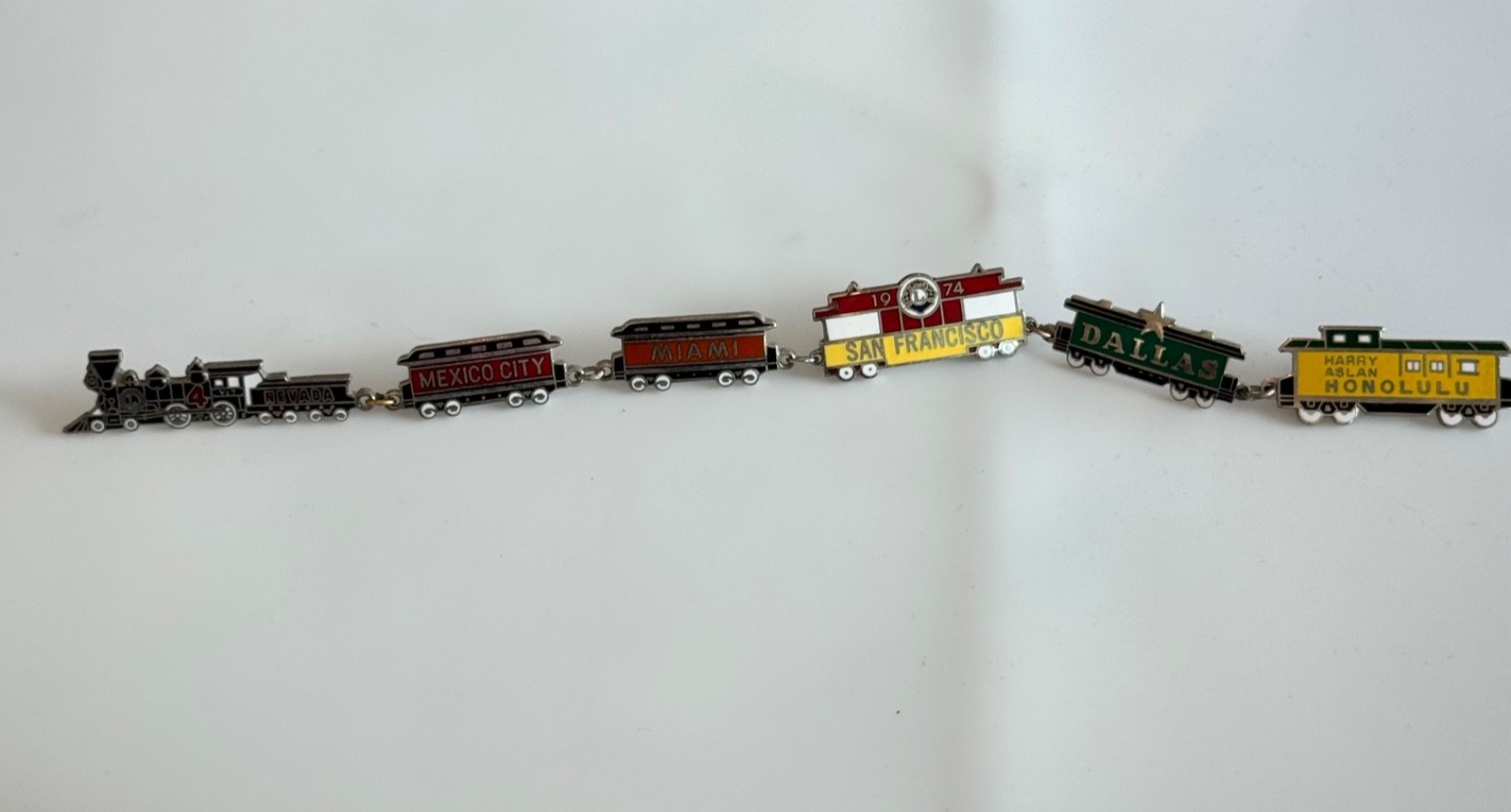 1974 LIONS CLUB GROUP OF 6 TRAIN PINS Nevada Mexico City Miami Honolulu